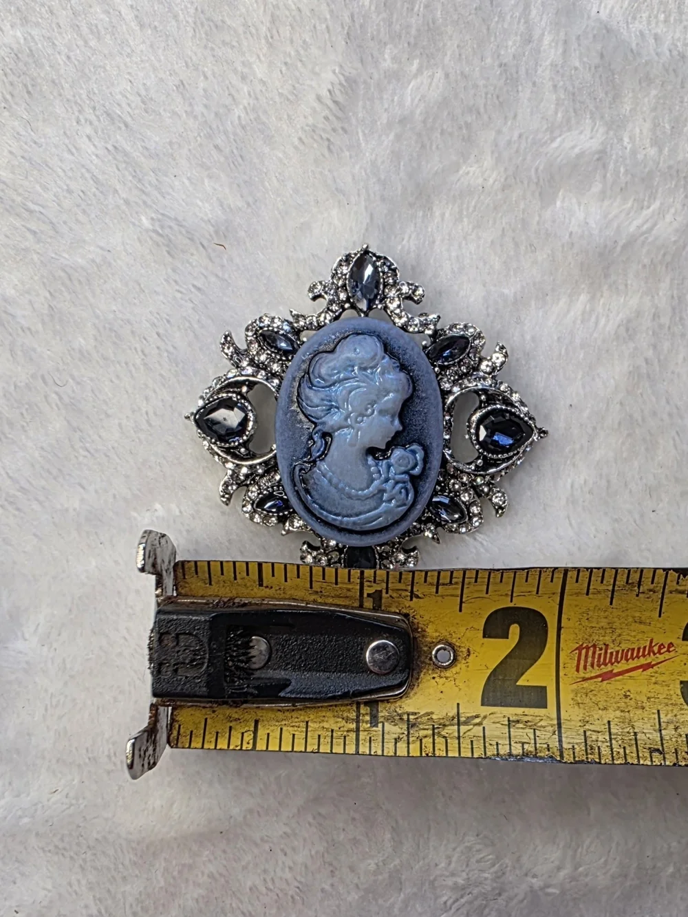 Vintage-Inspired Blue Cameo Brooch with Dark Blue Accents